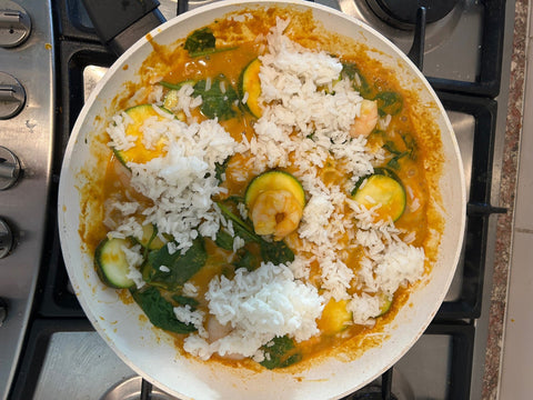 Mango curry with prawns zucchini and spinach